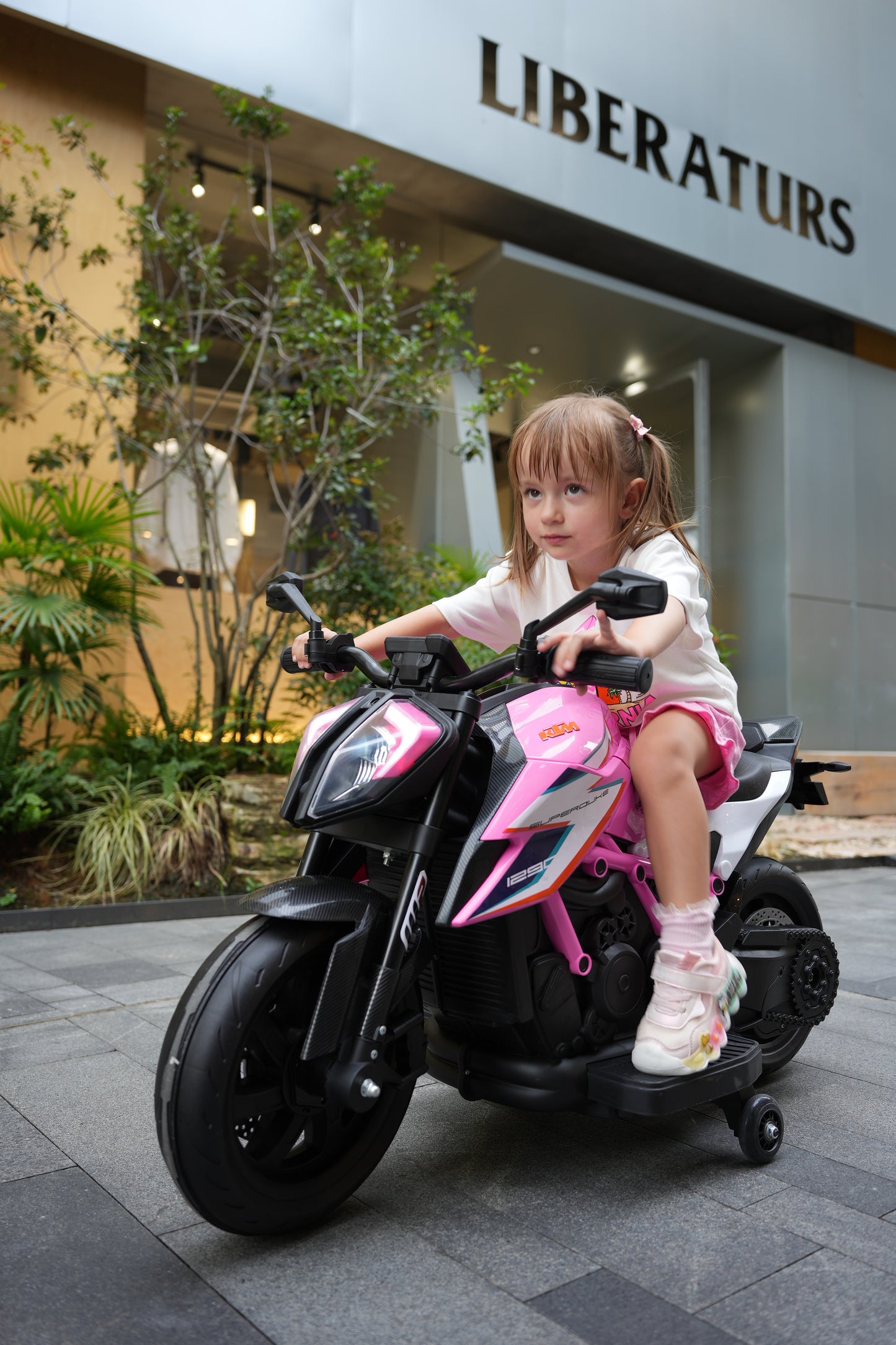 Genuine KTM Superduke 12v Electric Ride On Kids Motor Bike with Stabilizers - Pink