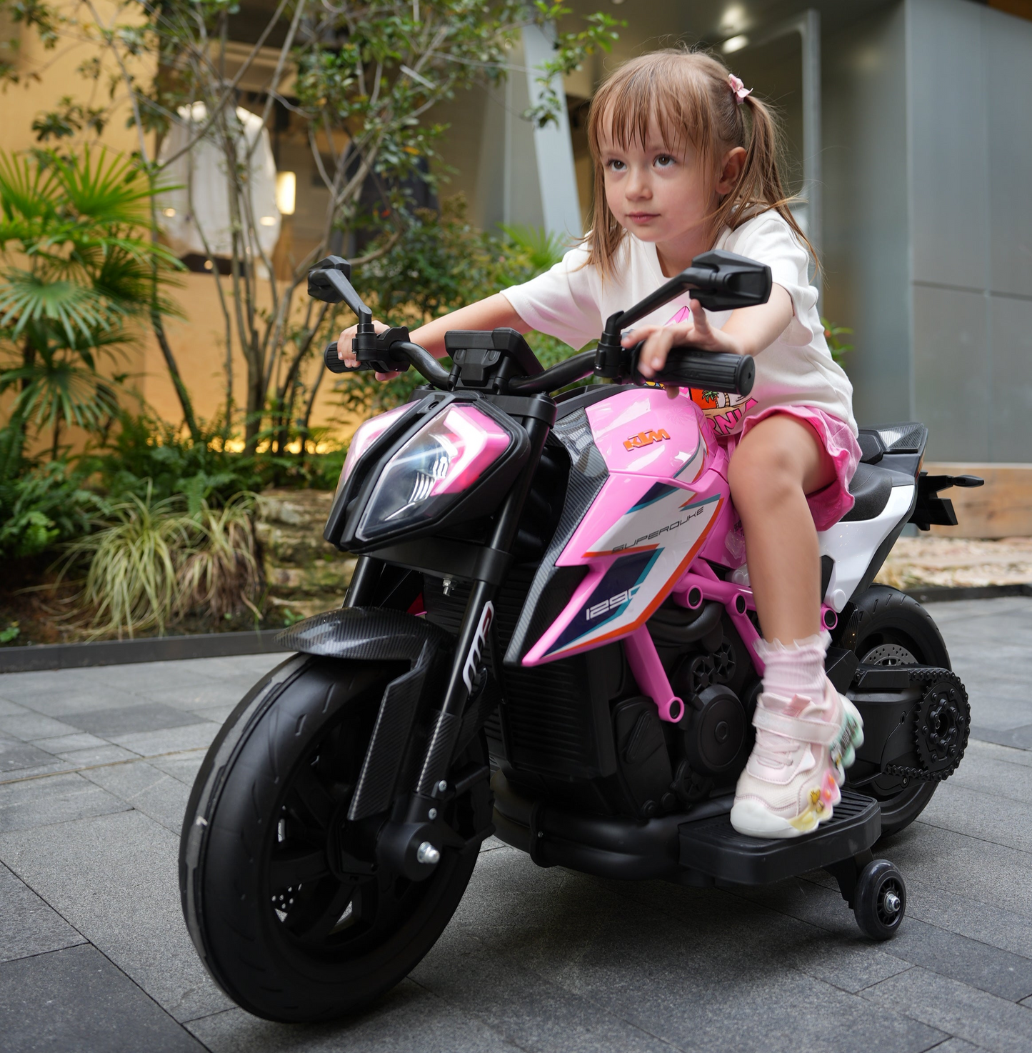Genuine KTM Superduke 12v Electric Ride On Kids Motor Bike with Stabilizers - Pink